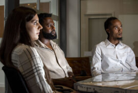 Bailey Alexander (left to right) Yekalo Weldehiwet and Willis Small sit inside the Rathod Mohamedbhai law office in Five Points. Aug. 17, 2022.